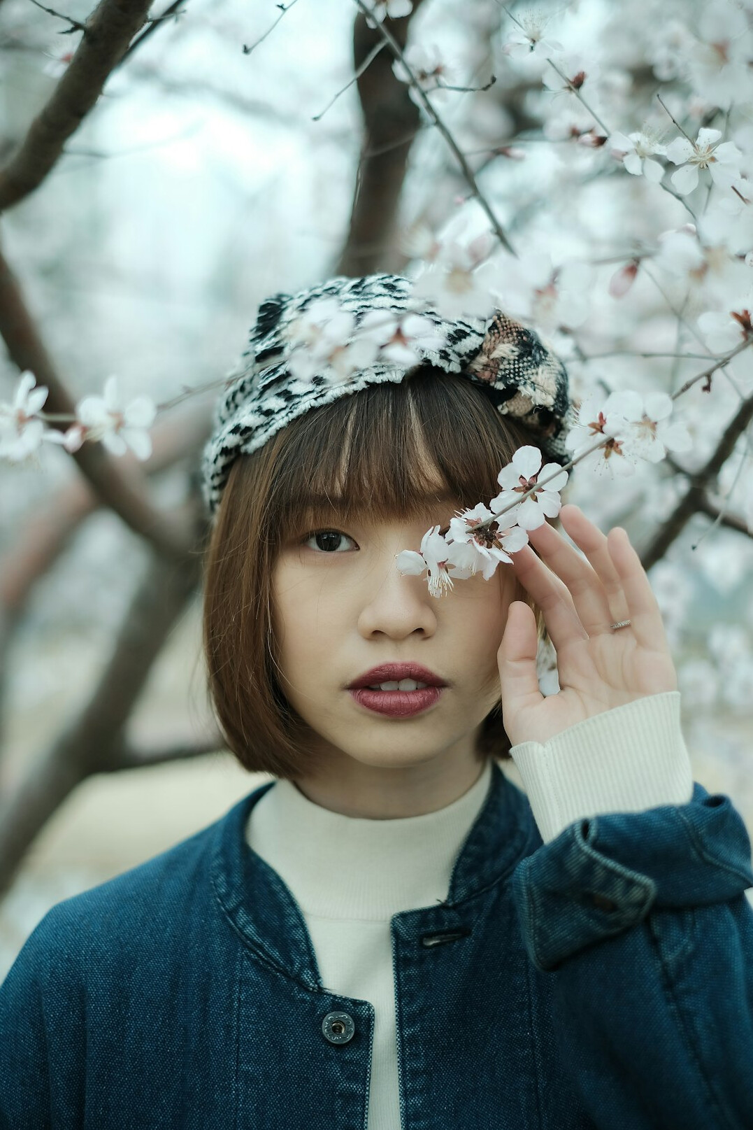 Japanese woman with short auburn hair portrait